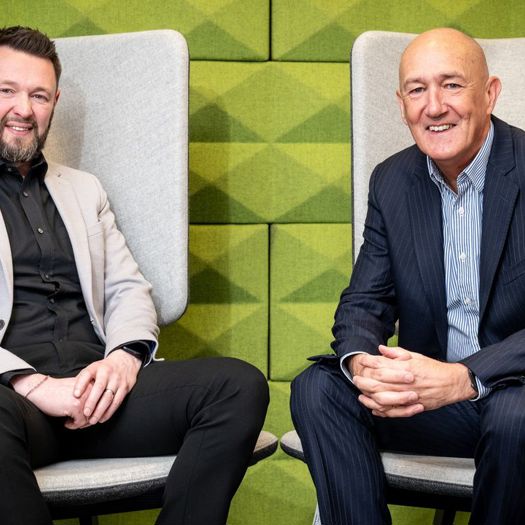 Colin Campbell (R) will retire after 50 years' full-time employment at Langstane Press